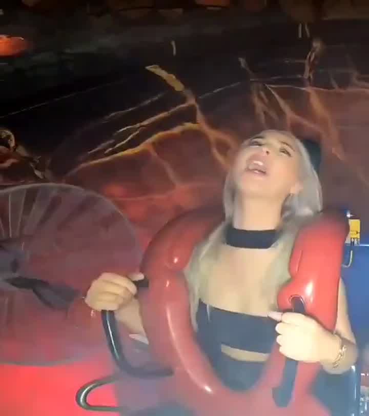 Blonde's Crop Top Fail on the Ride – Unexpected Boob Flash!